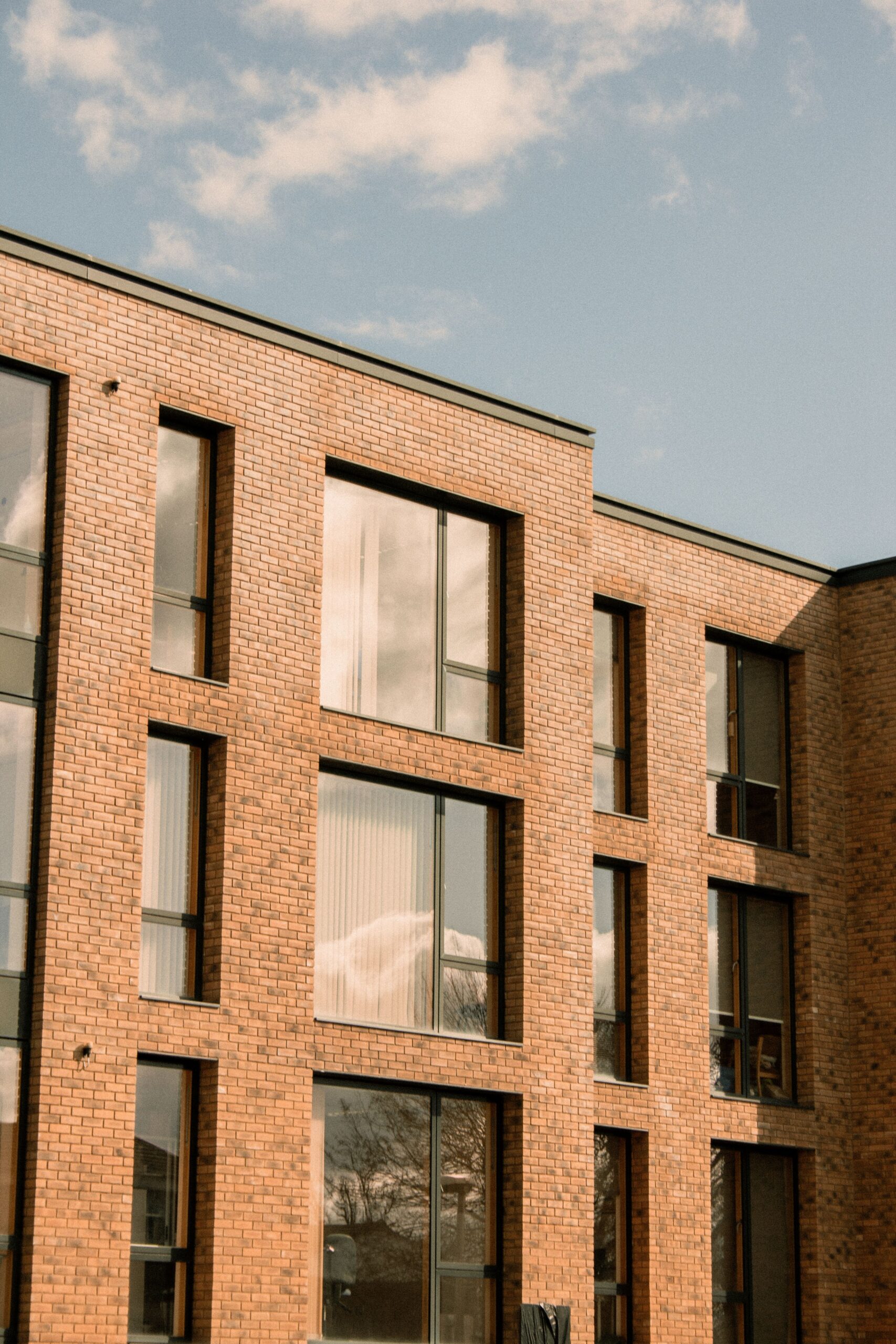 modern apartment building with large square windows