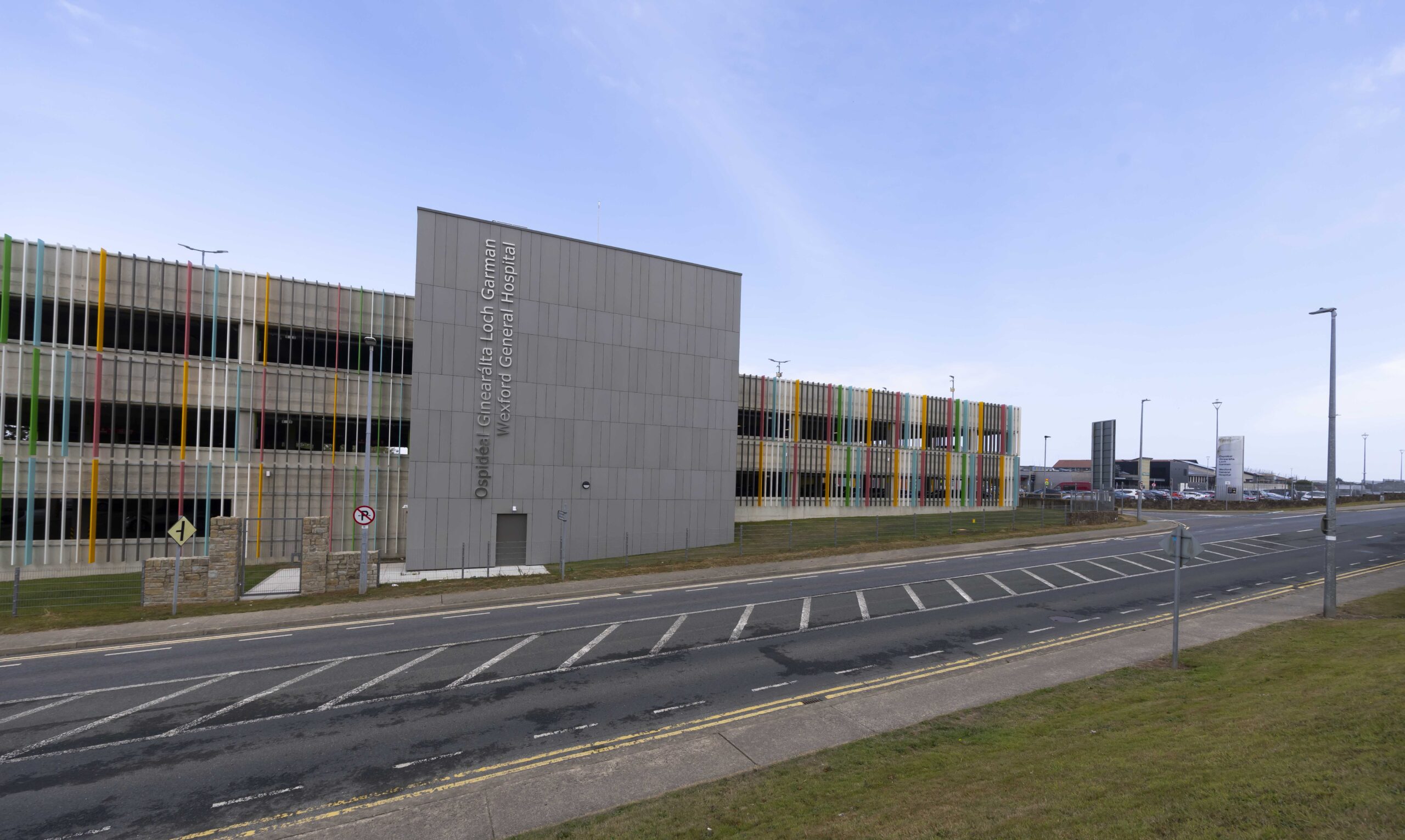 Looking at a large modern structure, with multiple storeys