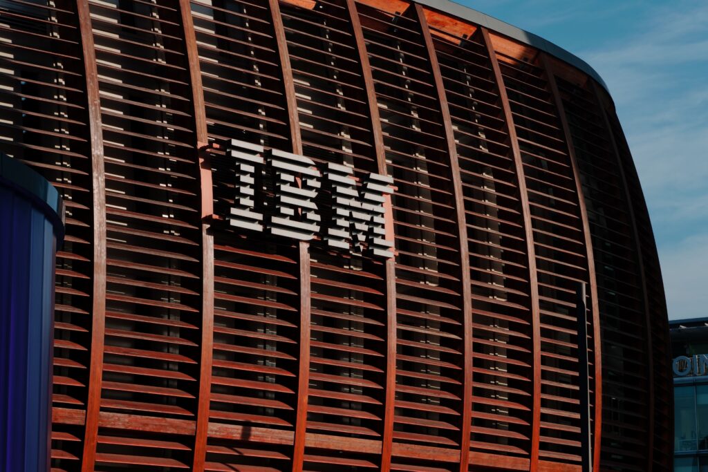 Front facade of an IBM office building with the logo in raised lettering